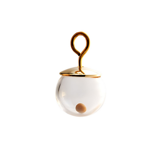 Close-up of a Regular 14K gold-filled mustard seed charm against a white background, featuring a single real mustard seed enclosed in a clear 10mm (slightly less than ½ inch diameter) hand-blown glass globe with a polished gold-filled cap and a handmade 3mm loop.