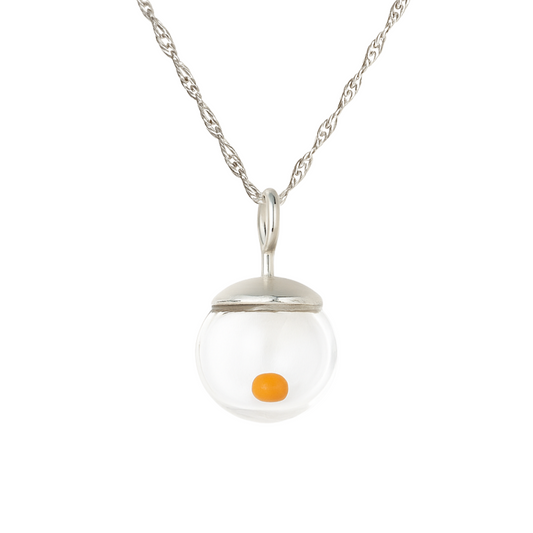 Sterling silver mustard seed necklace featuring a clear hand-blown glass globe pendant with a single real mustard seed inside, hanging from a delicate twisted Singapore-style chain.