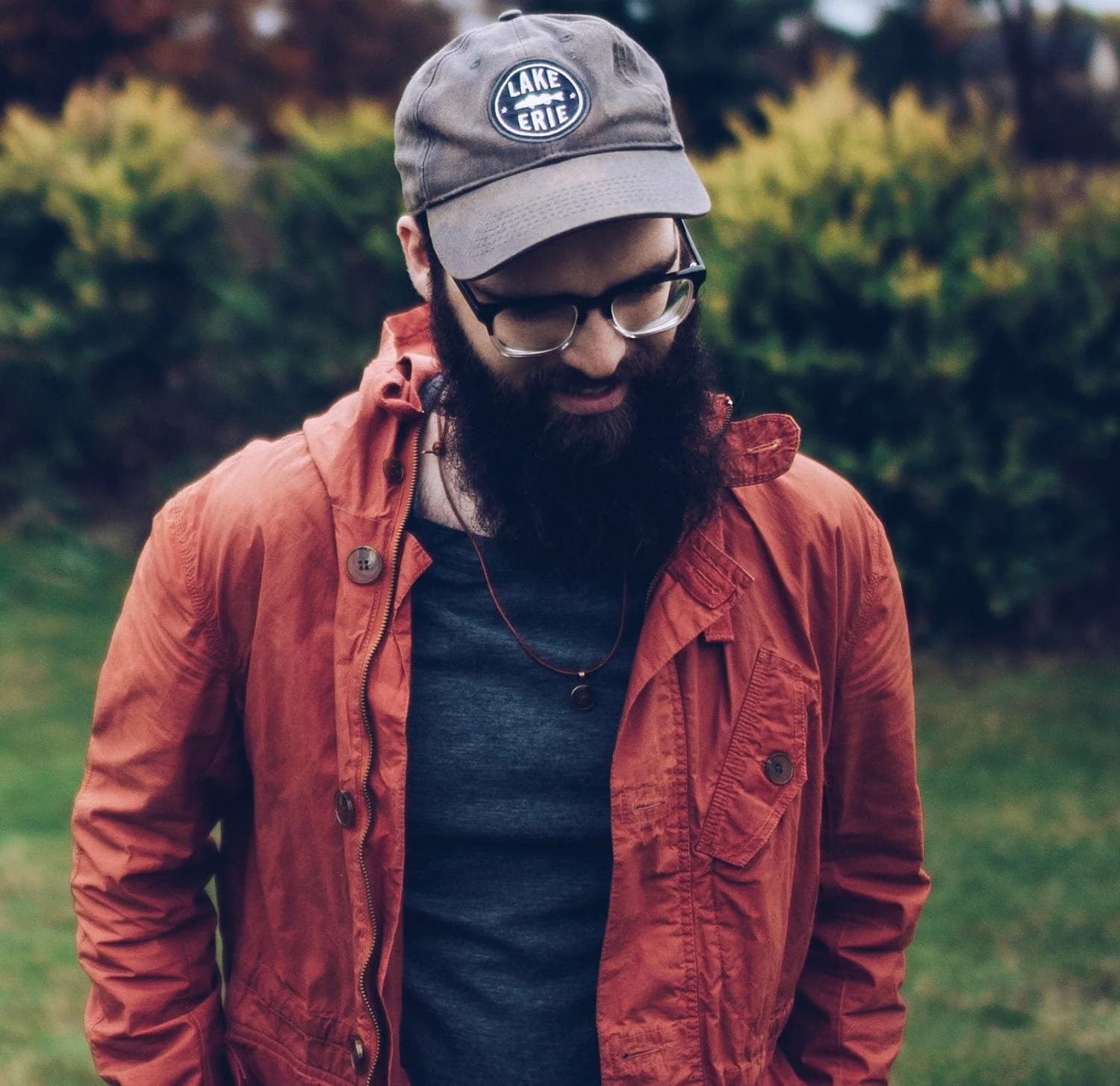 Man wearing a leather mustard seed necklace