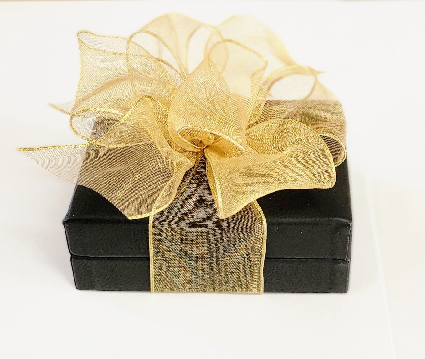 Your necklace will arrive gift-wrapped in a fine black leatherette jewelry box and is finished with a beautiful gold organza bow. Ready for gift-giving!