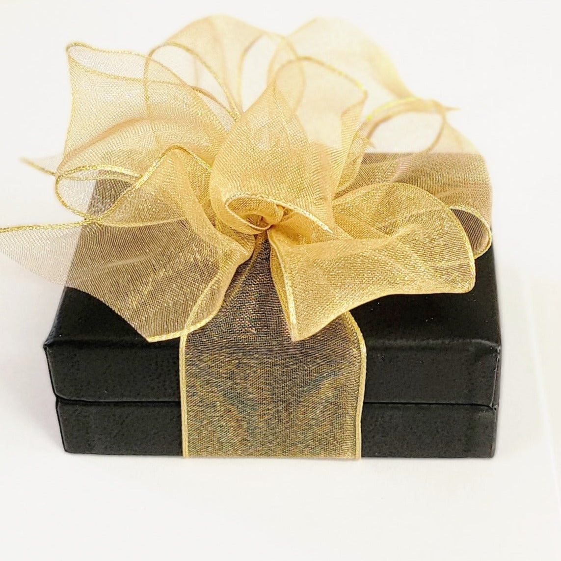 Your necklace will arrive gift-wrapped in a fine black leatherette jewelry box and is finished with a beautiful gold organza bow. Ready for gift-giving! 