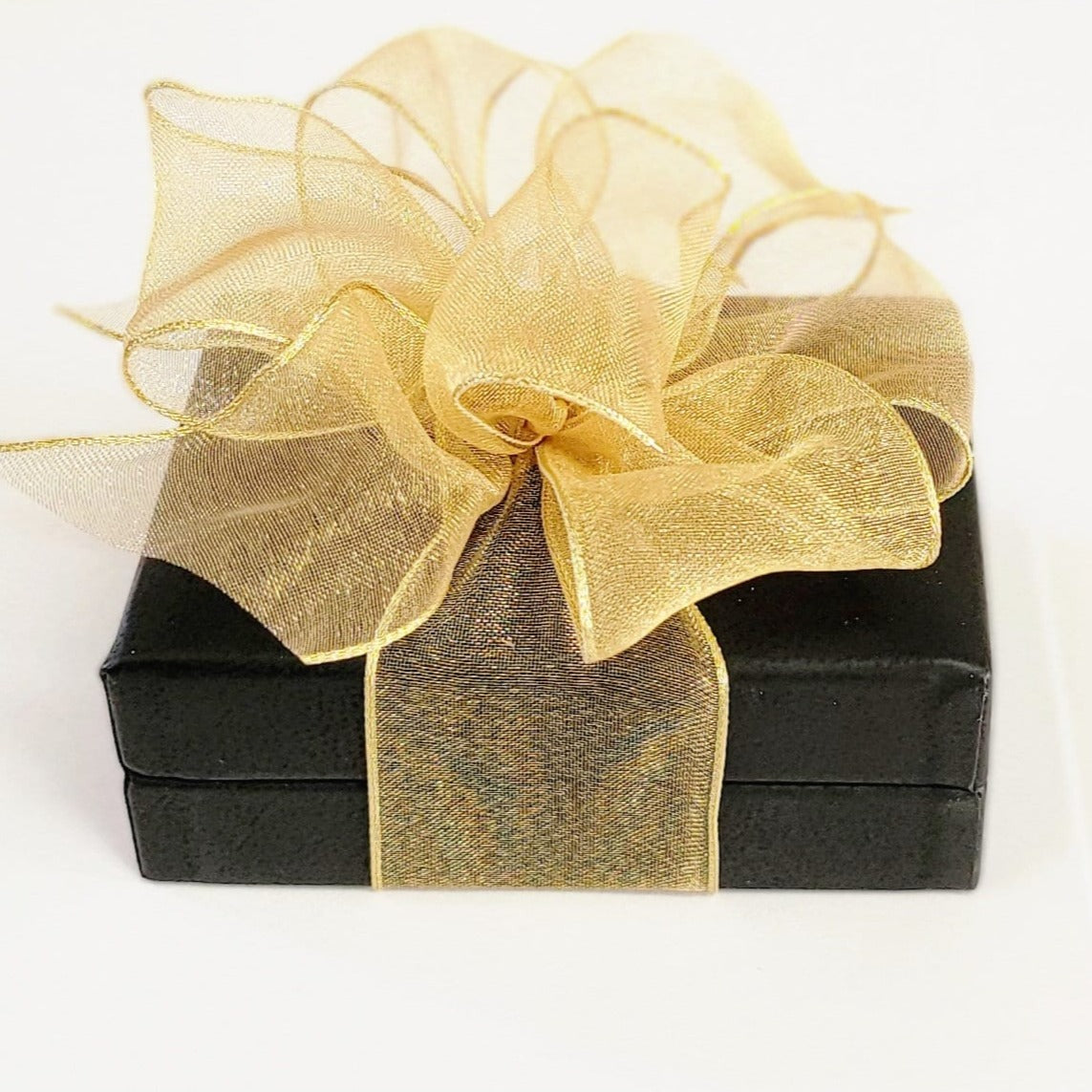 Your necklace will arrive gift-wrapped in a fine black leatherette jewelry box and It is finished with a beautiful gold organza bow. Ready for gift-giving! All orders ship the next business day!