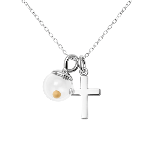 Sterling silver cross necklace with glass globe mustard seed pendant symbolizing faith on a pure white background
